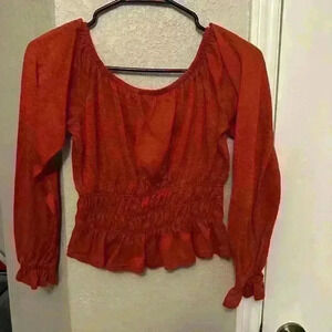 Burnt orange ruffed long sleeve shirt